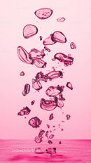 Pink Glass Shards Falling in Artistic Suspension