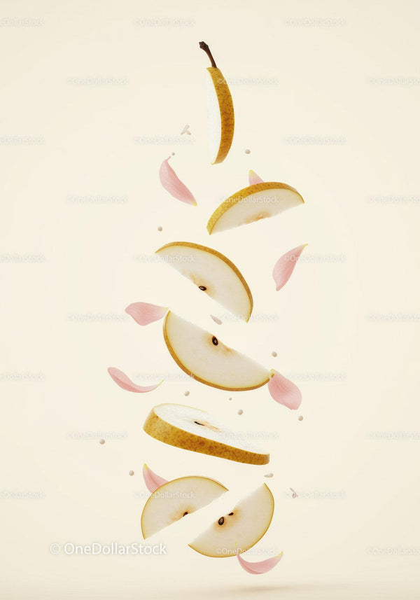 Floating sliced Asian pear with delicate pink petals