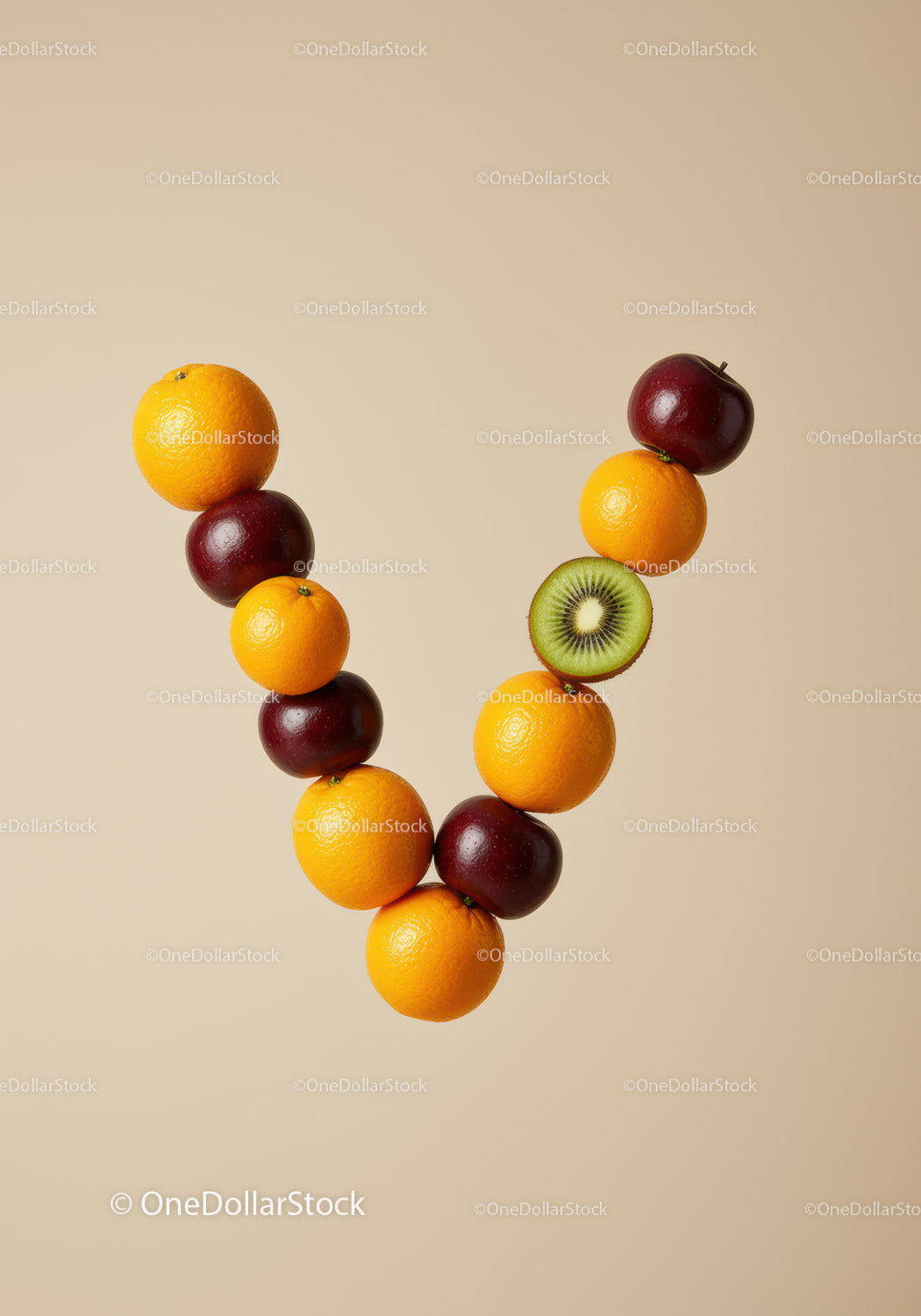 Balanced V-shaped arrangement of fresh colorful fruits