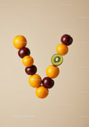 Balanced V-shaped arrangement of fresh colorful fruits