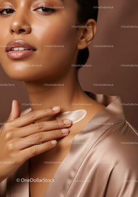 Close-Up of Woman Applying Moisturizer on Neck in Beauty Routine