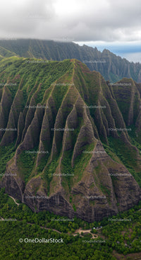Green Mountain Ridge with Lush Forest and Dramatic Cliffs