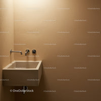 Modern beige utility sink with wall-mounted faucet in minimalist interior