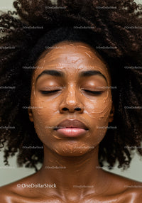 Young Woman Relaxing with Facial Mask in Spa Setting
