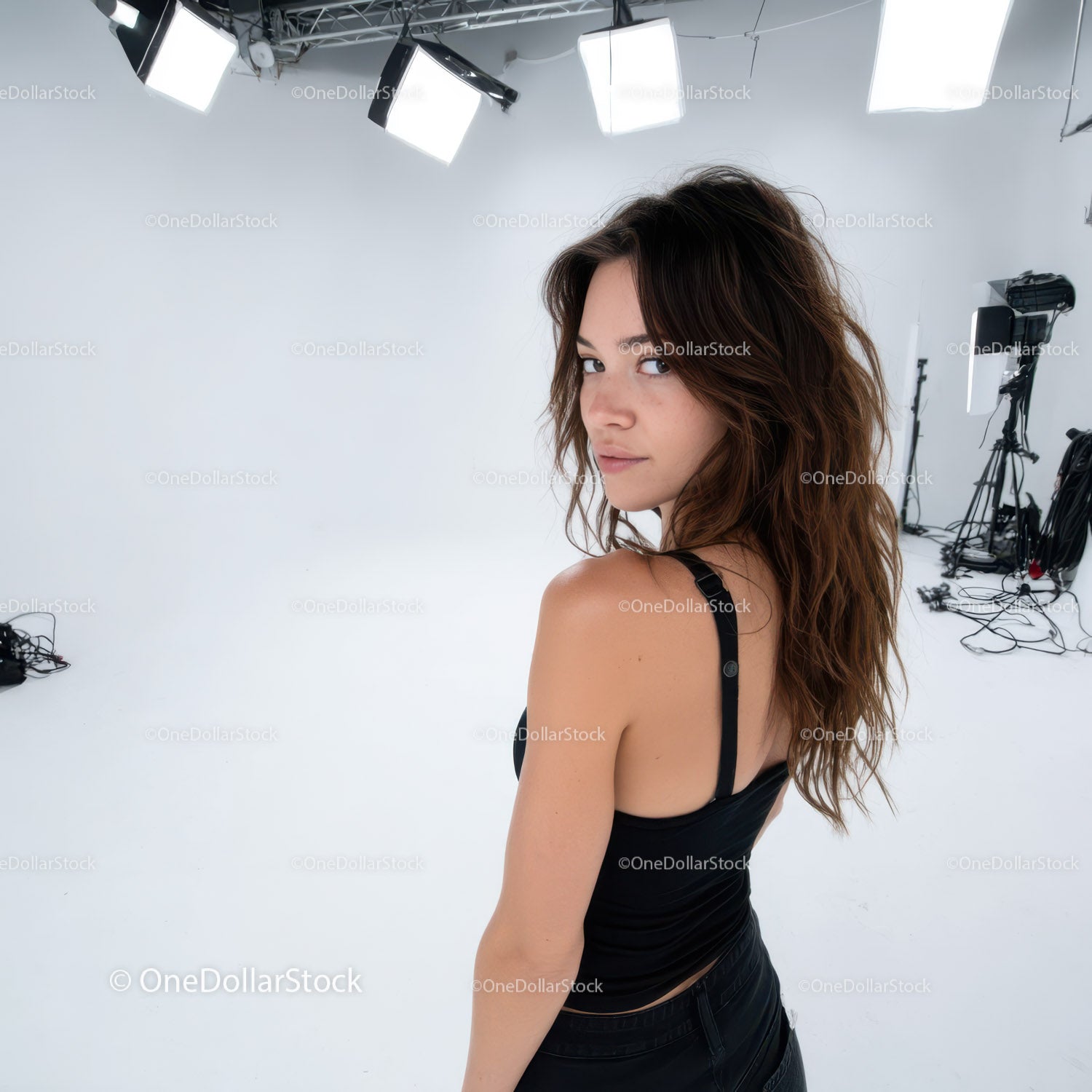 Confident Young Woman in Black Top Studio Portrait