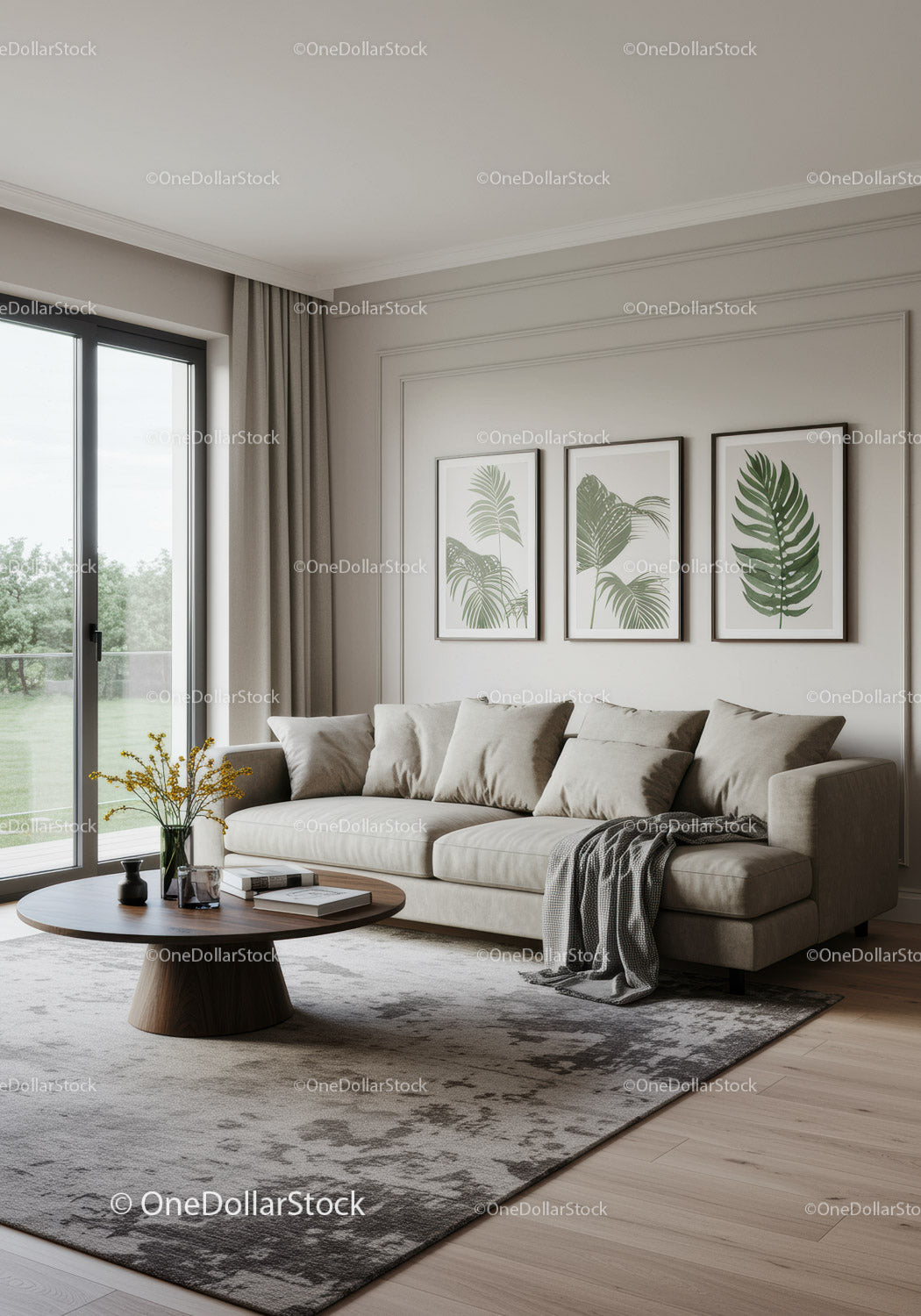Elegant Modern Living Room with Tropical Leaf Art and Natural Light