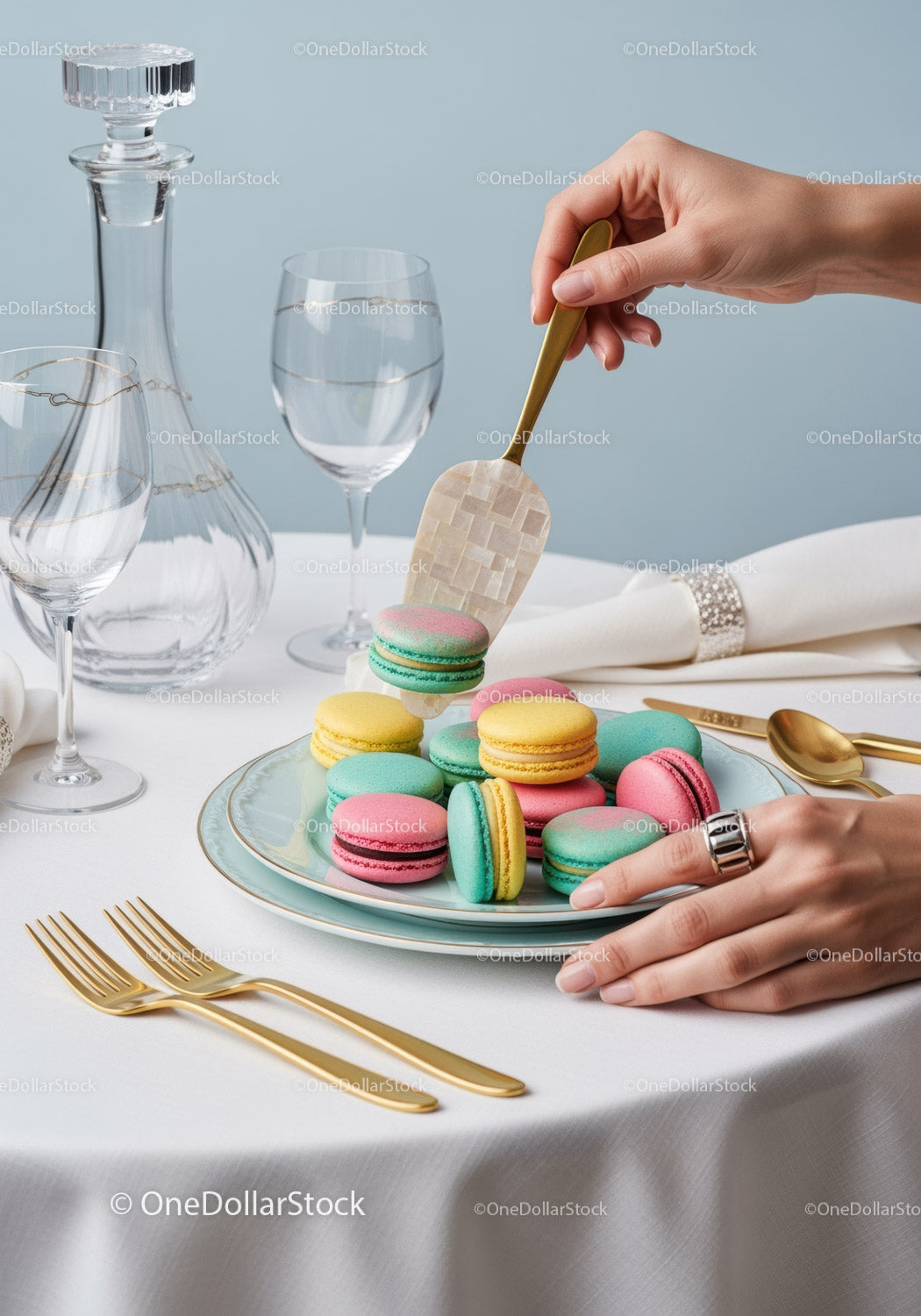 Colorful Macarons on Elegant Table with Gold Cutlery and Crystal Glasses