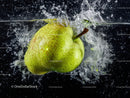 Fresh Green Pear Splash with Water Droplets