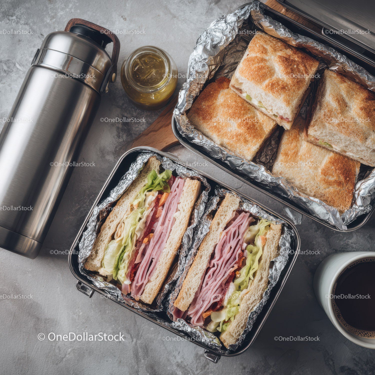 Toasted Ham and Lettuce Sandwiches with Fresh Bread and Foil Wraps