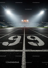 Empty running track lanes illuminated at night stadium