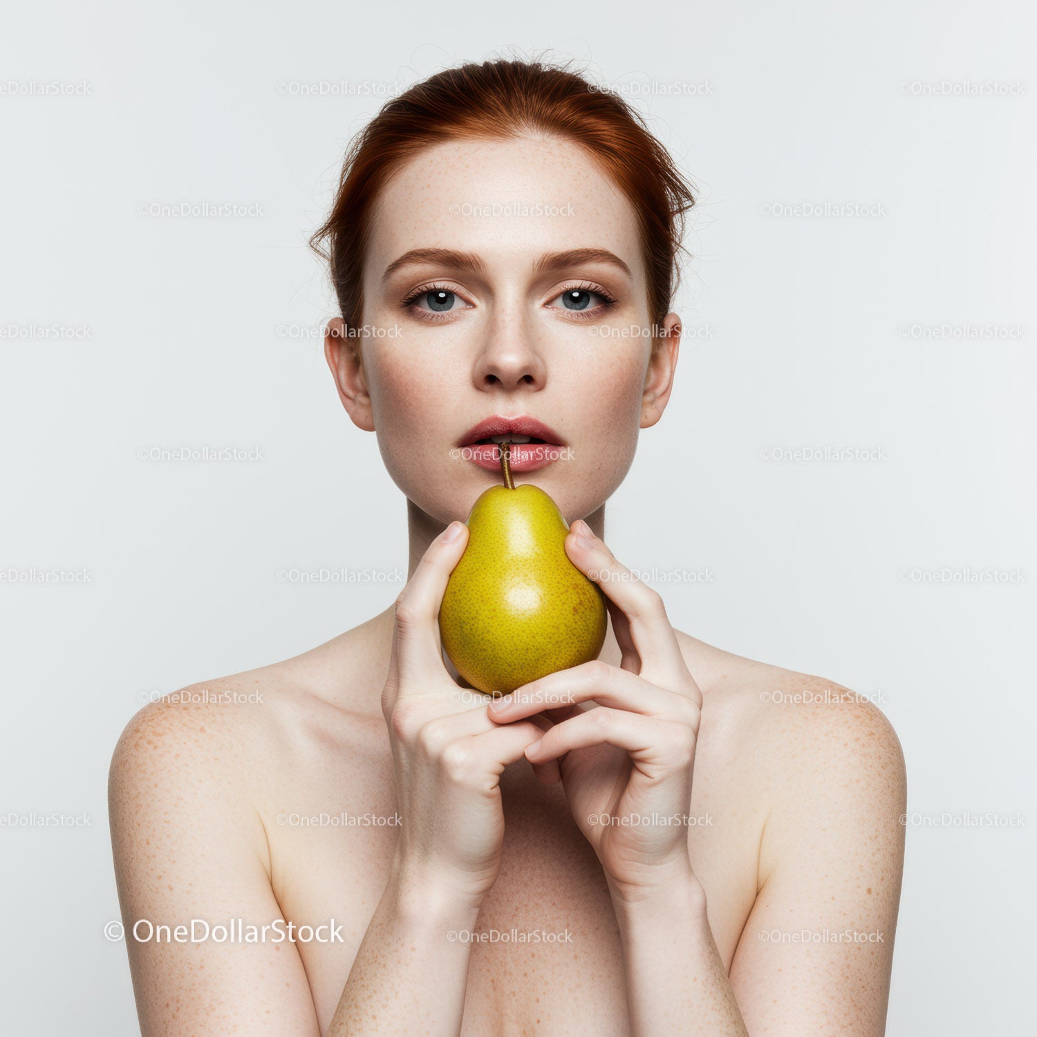 Elegant Woman Holding Green Pear with Pink Lips and Red Hair