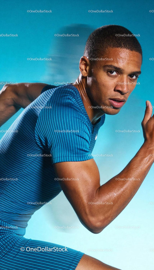 Focused athlete sprinting intensely with determination