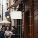 Blank Outdoor Shop Sign on Wood Wall in Urban Street