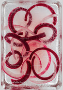Red Onion Rings Encased in Clear Ice Cube