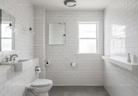Bright Modern Bathroom with White Subway Tiles and Natural Light