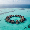 Overwater Bungalows Surrounded by Turquoise Lagoon in Tropical Paradise