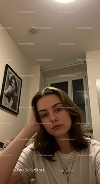 Young woman relaxing at home in cozy atmosphere