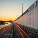 City Highway with Light Trails During Sunset in Urban Environment