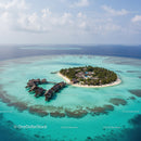 Overwater Bungalows on Turquoise Ocean with Scenic Island View