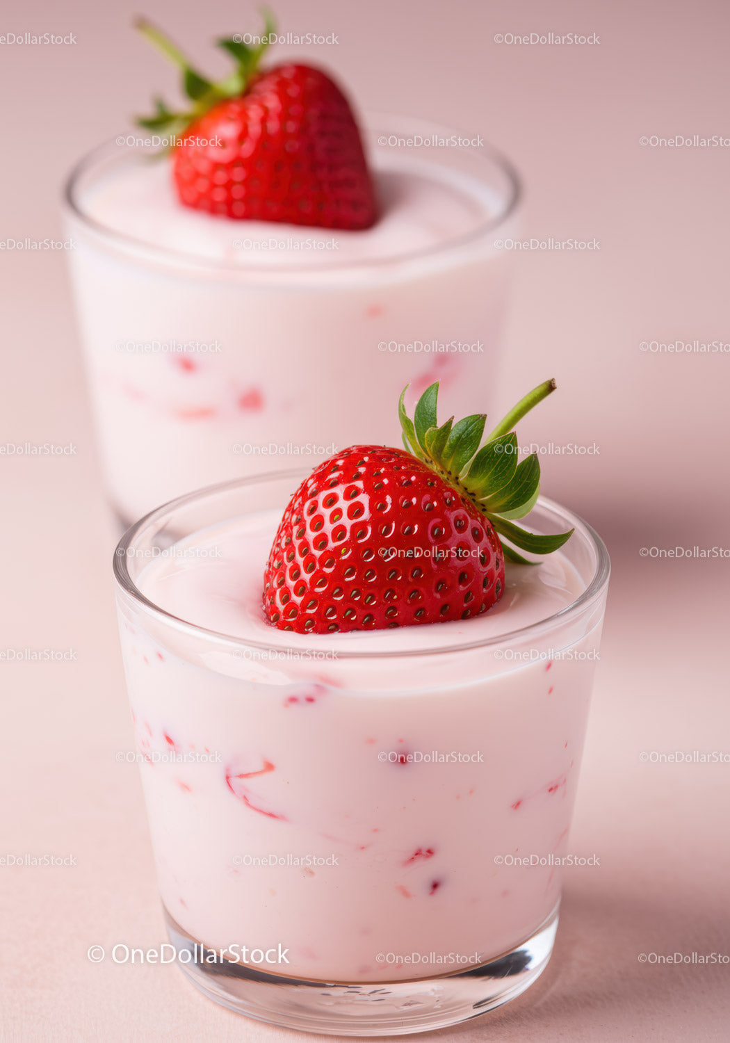 Fresh strawberry yogurt dessert in clear glasses