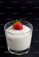 Fresh Strawberry Topped Creamy Yogurt in Glass