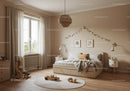Kids Bedroom with Soft Bedding and Playful Wall Decor in Neutral Tones