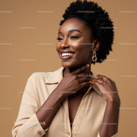 Elegant Woman with Gold Earrings and Bright Smile in Studio Portrait