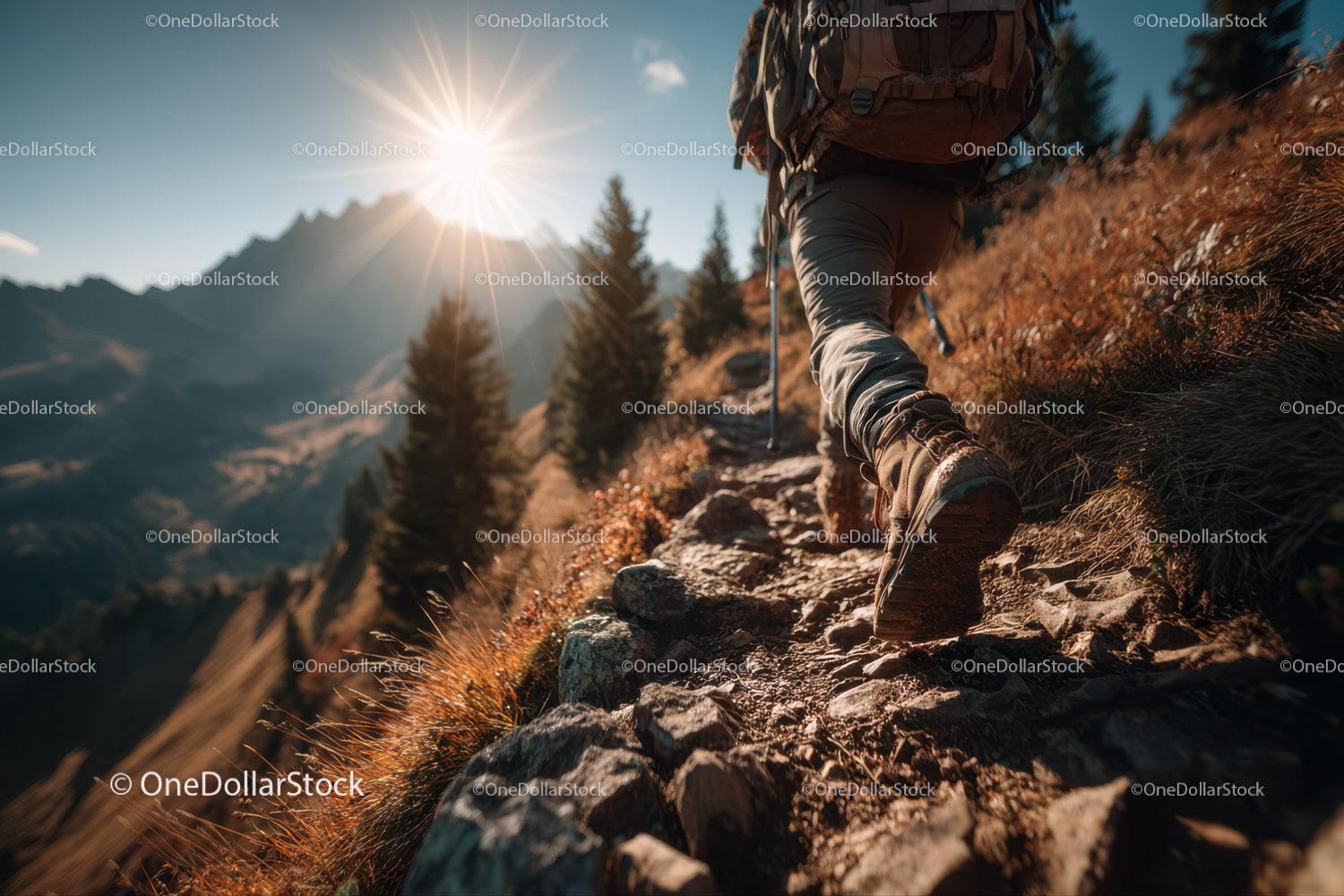 Hiker Climbing Rocky Mountain Trail Under Sunlit Sky