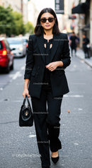 Stylish Woman in Black Suit Walking Through City Street