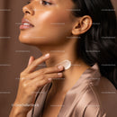 Elegant Woman Applying Face Cream on Neck in Close-Up