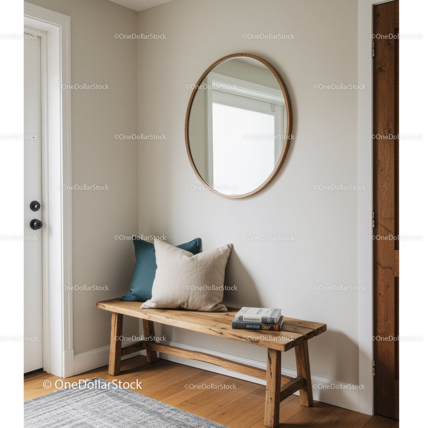 Minimalist Entryway with Wooden Bench and Round Mirror in Cozy Decor