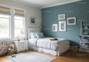 Stylish Blue Accent Wall Bedroom with Gallery Artwork and Cozy Decor