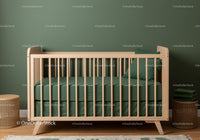 Stylish Wooden Baby Crib with Green Bedding in Modern Nursery