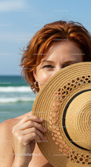 Sunlit Woman with Straw Hat at Beachscenery with Ocean View