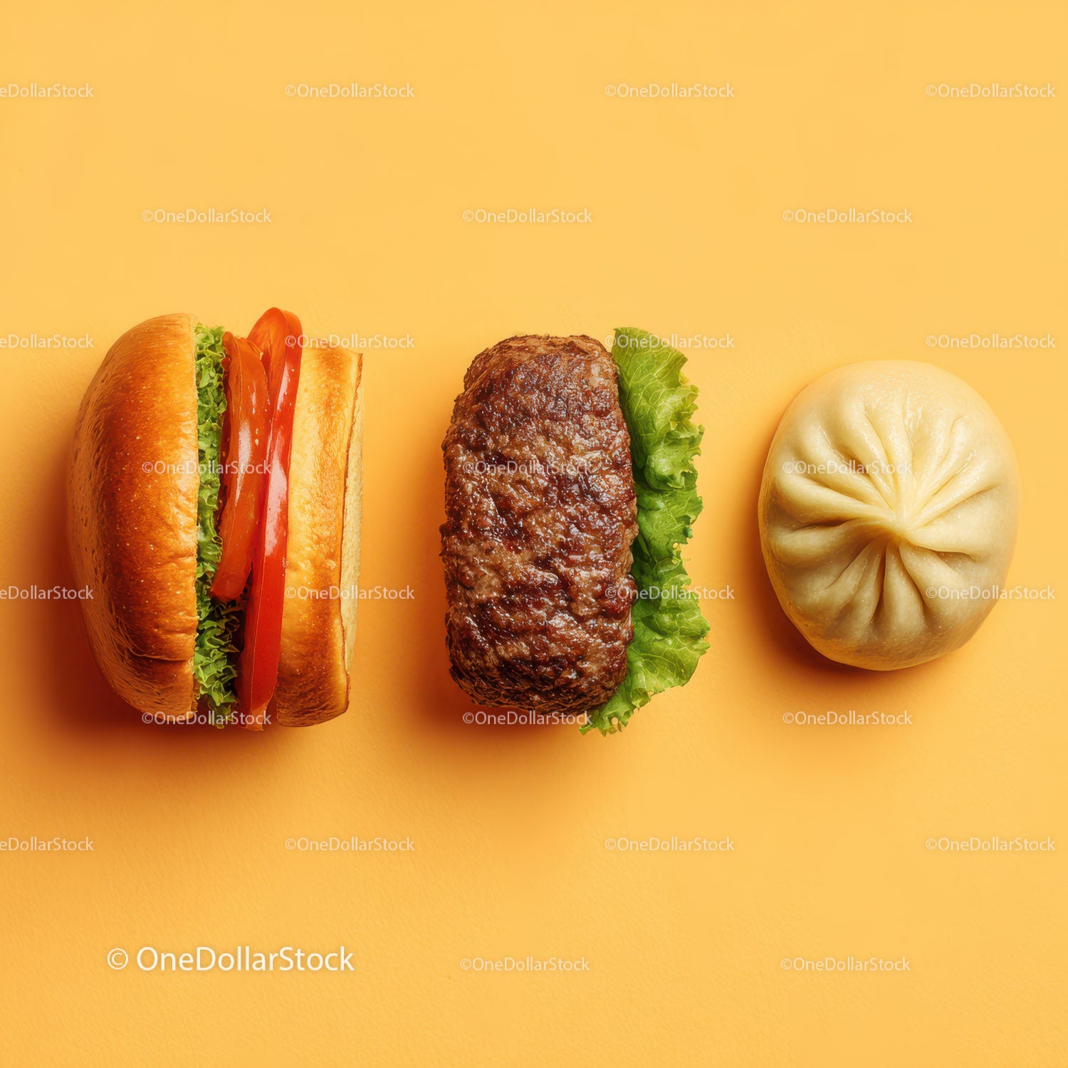 Gourmet Burger with Lettuce and Tomato Next to Grilled Steak and Dumpling