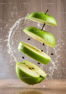 Sliced Green Apple with Splashing Water Drops