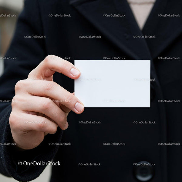 Person Holding Blank White Business Card Outdoors JPG Mockup Image