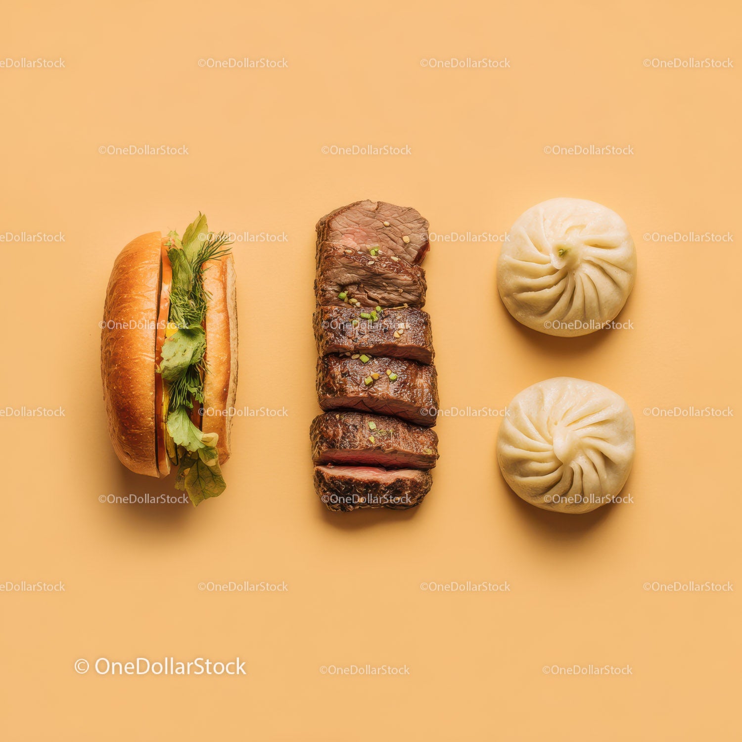 Gourmet Burger with Lettuce and Tomato Next to Grilled Steak and Dumpling