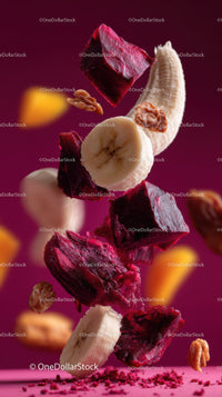 Vibrant Fresh Fruit and Nut Mix with Flying Banana and Beetroot