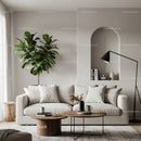 Cozy living room with neutral sofa and green plant