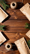 Eco-Friendly Packaging with Rustic Twine and Pine Branches
