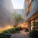 Modern Minimalist Indoor Garden with Tropical Plants and Cozy Seating