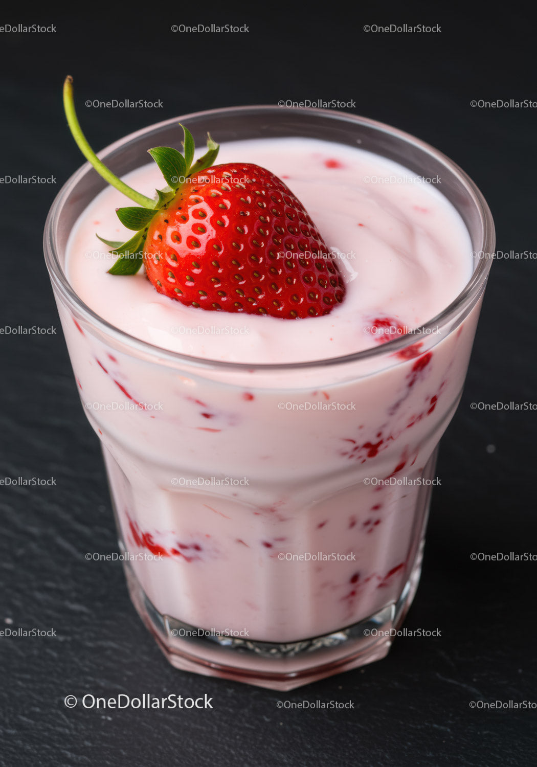Creamy strawberry yogurt dessert in clear glass