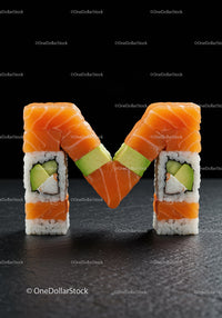 Creative Sushi Rolls Forming Letter M on Black Background