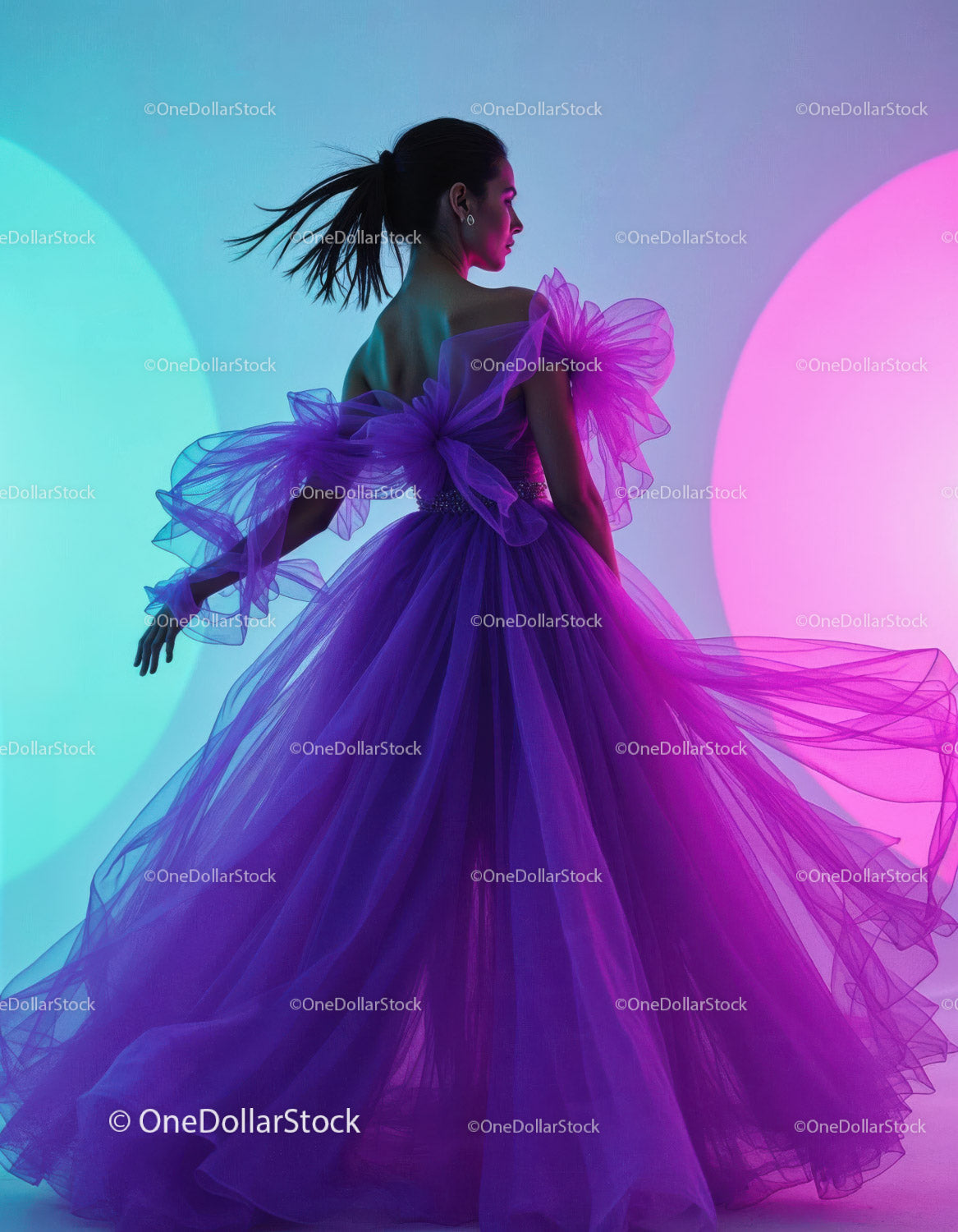 Elegant Woman in Vibrant Purple Tulle Dress with Colorful Lighting