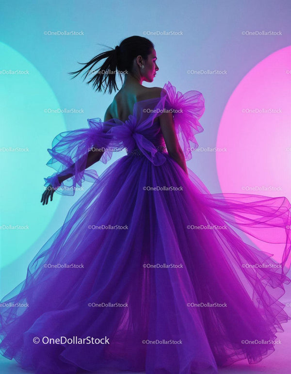 Elegant Woman in Vibrant Purple Tulle Dress with Colorful Lighting
