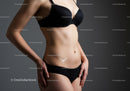 Elegant Woman in Black Lingerie with Body Tattoo Studio Portrait