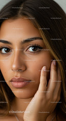 Close-Up Portrait of a Woman with Brown Eyes and Natural Makeup