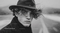 Black and White Urban Portrait of Young Man with Wavy Hair