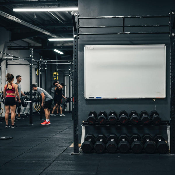 People Training with Barbells and Dumbbells in Modern Gym JPG Mockup Image